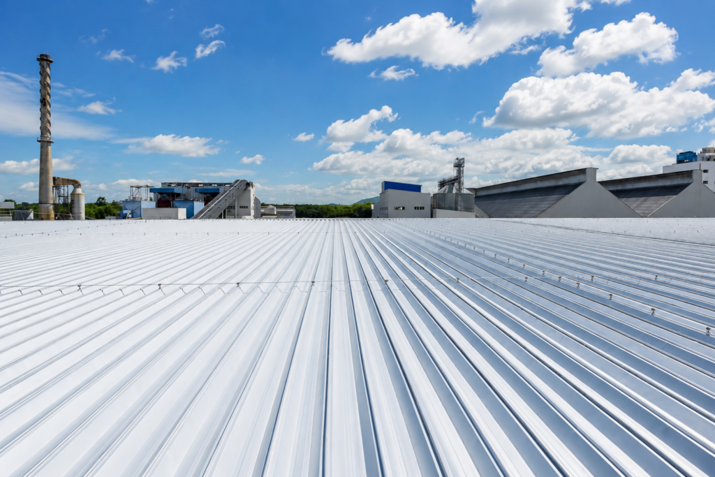 Commercial metal roofing installed on an industrial building
