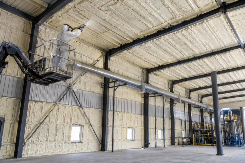 Industrial SPF insulation installation in a manufacturing facility